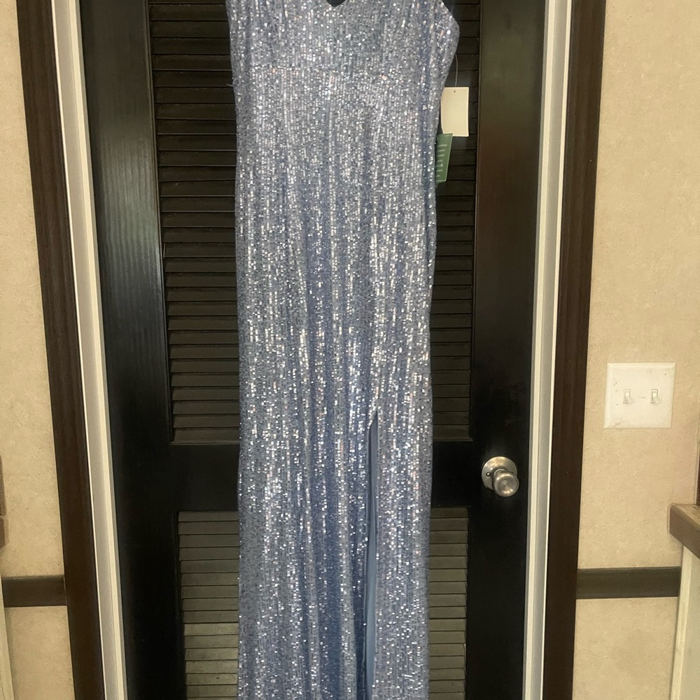 NWT Sz 15 Jackie Jon Floor Length Sequin Gown, with split. Light blue in color.